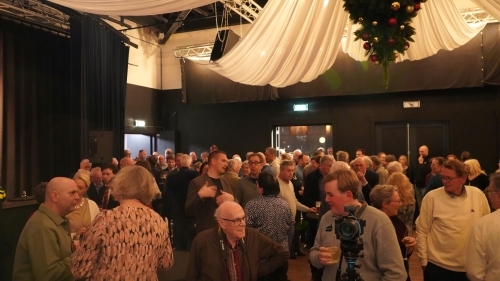 Een foto van het publiek tijdens de nieuwjaarsonmoeting